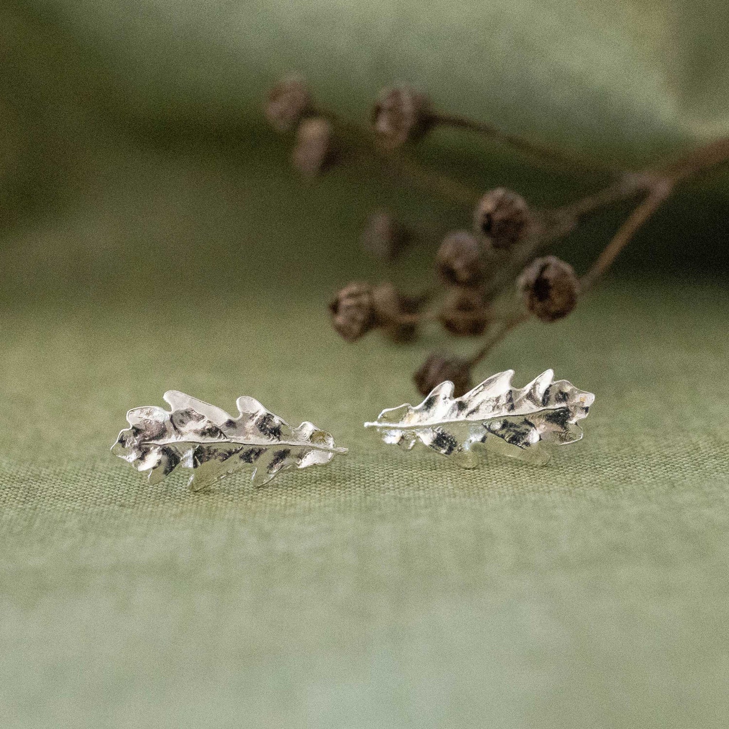 Oak leaf studs handcrafted in sterling silver. 